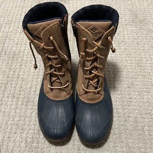 Sperry rain boots with interior lining.